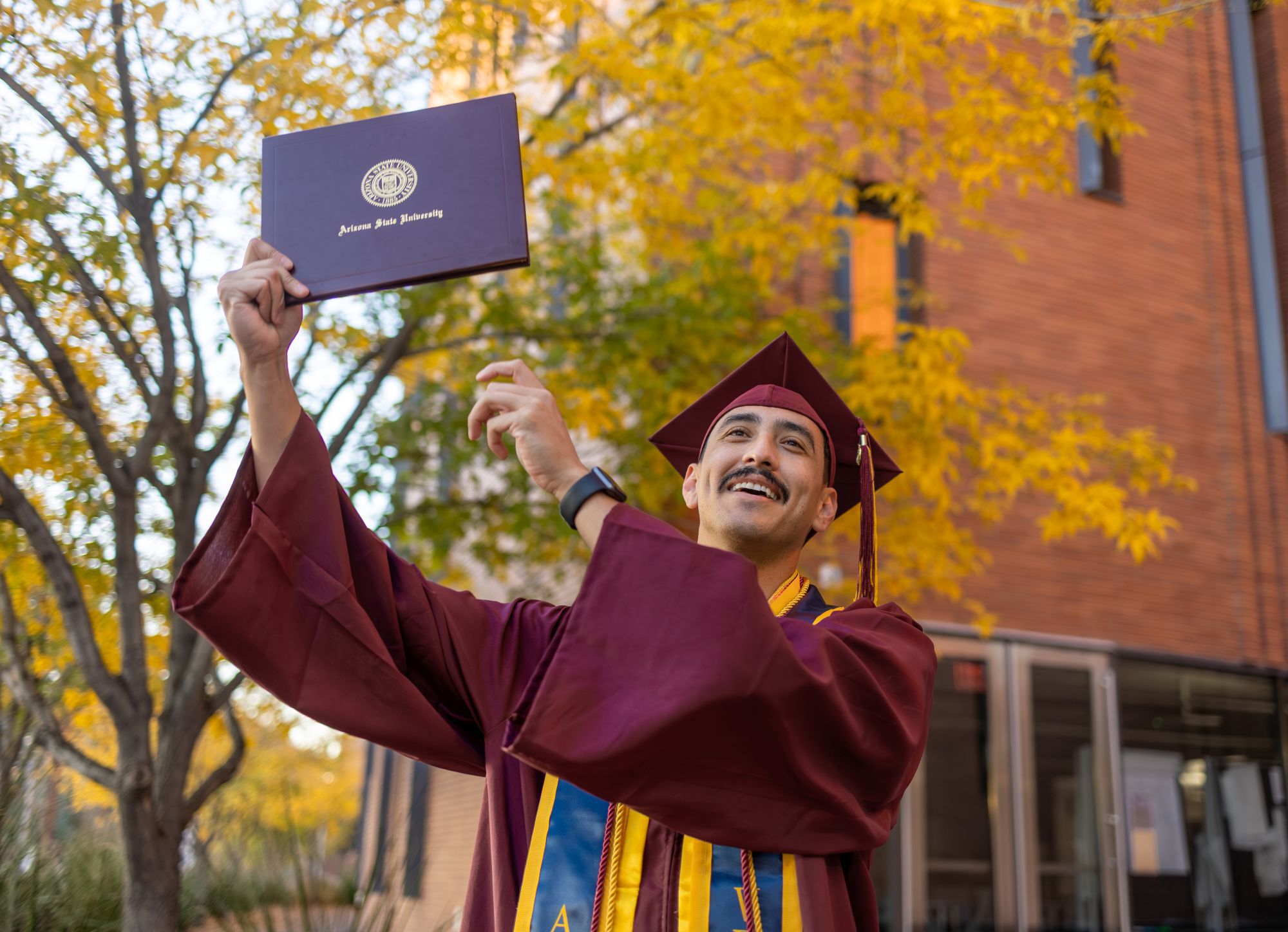 ASU grad celebrating